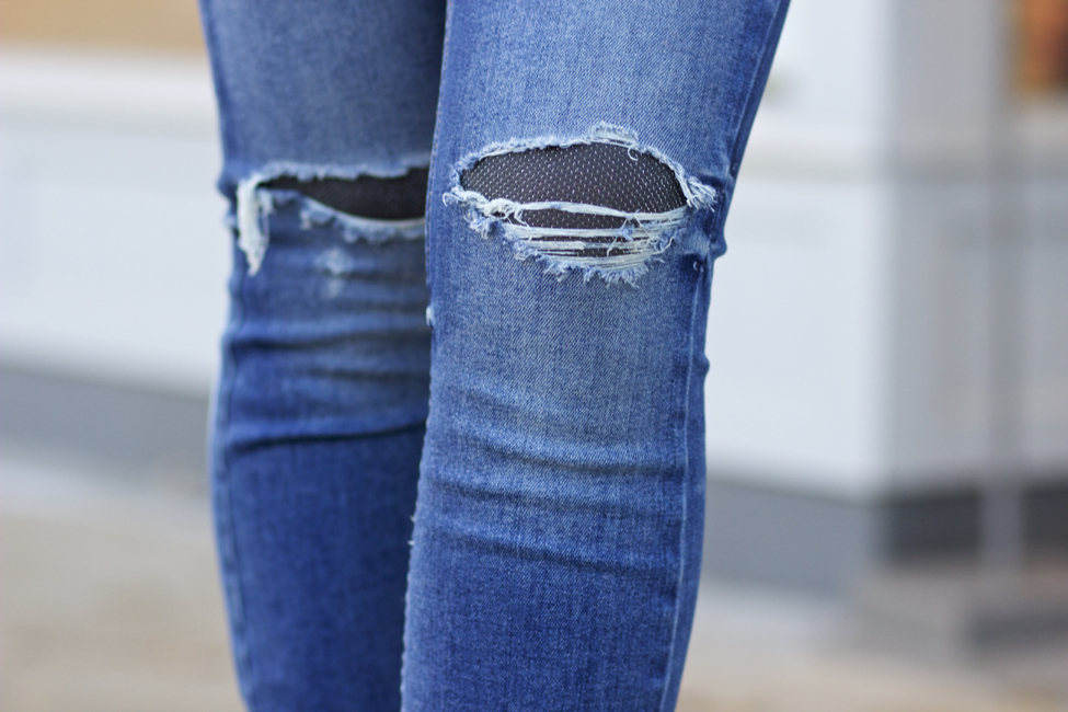 black leggings under ripped jeans